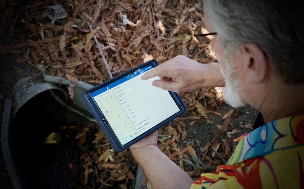 man using precivision software on a tablet